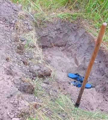 На Київщині чоловік вбив приятеля та викопав йому могилу у дворі (ФОТО)
