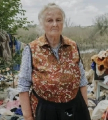 «Портрет людства»: премією відзначили фото з херсонкою, дім якої постраждав внаслідок підриву росіянами Каховської дамби