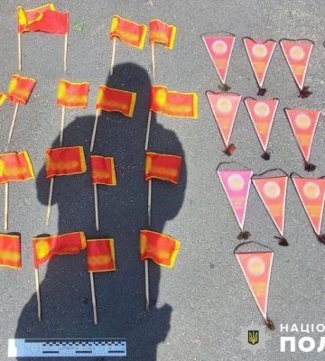 Розвісив символіку радянських часів на паркані навчального закладу: поліція затримала киянина