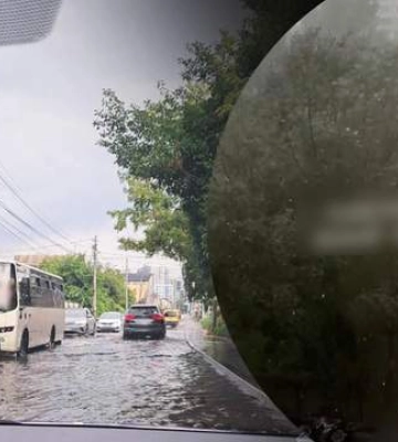 Пориви вітру та погіршення видимості на дорогах: Київ накрила сильна злива. Фото і відео