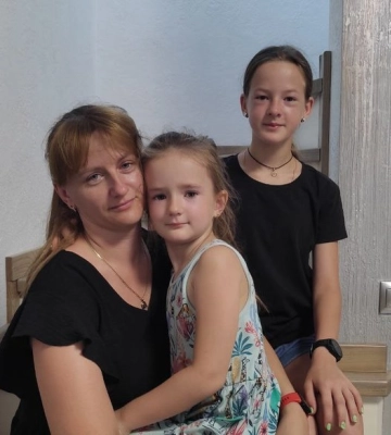 «Тепер квіти мені дарують доньки», – дружина загиблого на війні тренера з Луцька Романа Гаврилюка