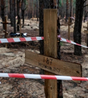 Біля звільненого Ізюма виявили масове поховання військових ЗСУ