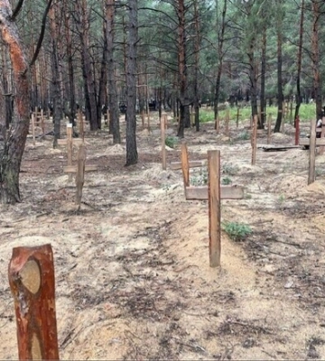 В Изюме обнаружили массовое захоронение более 440 человек
