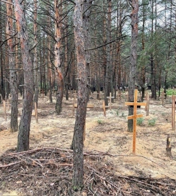 В Ізюмі розпочалися процесуальні дії щодо масових поховань
