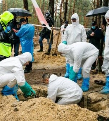 З місця масового поховання в Ізюмі на Харківщині всього ексгумували 436 тіл, - ОВА. ФОТОрепортаж