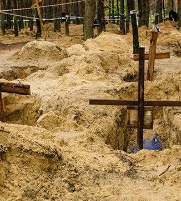 Поліція виявила ще три місця масових поховань у Харківській області