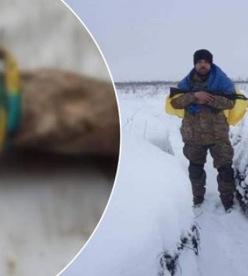 Тіло військового з синьо-жовтим браслетом на руці передали для поховання