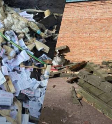 «Успей сдаться» – в Изюме нашли склад с вражескими боеприпасами и пропагандистскими листовками 