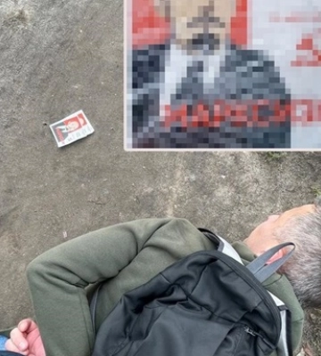 В Киеве мужчина распространял листовки с коммунистической символикой