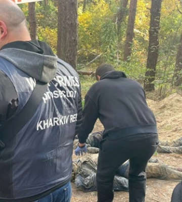 На Харьковщине обнаружены тела двух казненных людей. 18+