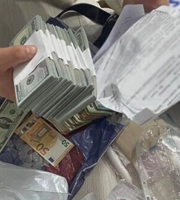 У лікарки з Житомира, яка допомагала ухилянтам отримати фіктивні діагнози, виявили 4,4 млн грн, - Нацполіція. ФОТО