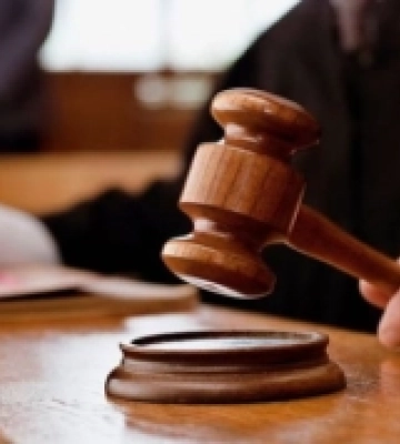 Суд виніс вирок у справі двох охоронців російської катівні, яка діяла під час окупації Херсона