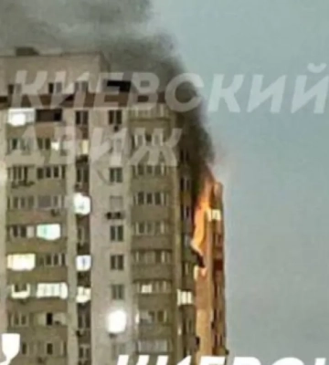 В Киеве взрывы: горят верхние этажи многоэтажки. ВИДЕО (обновлено)