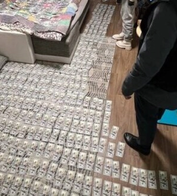 СБУ знайшла у керівниці Миколаївської обласної МСЕК 450 тисяч доларів та колекцію ювелірних виробів