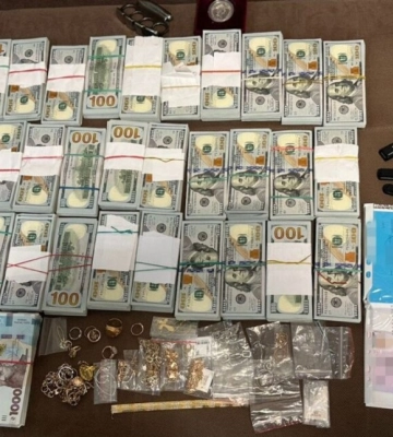Пів мільйона доларів і російський паспорт сина: СБУ провкела обшуки у керівниці Миколаївської МСЕК