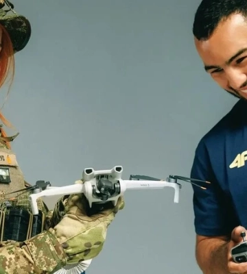 Українські медалісти Олімпіади взяли участь у емоційній фотосесії з військовими