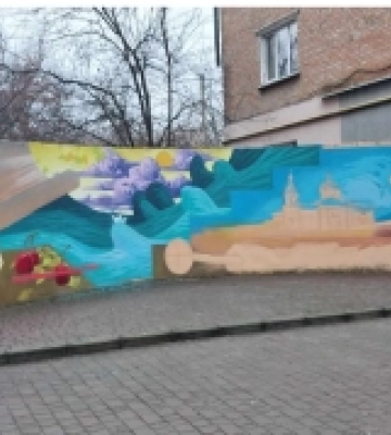 На Кіровоградщині харківський художник створює стінопис
