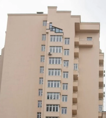 У Києві відновили багатоповерхівку, пошкоджену російською ракетою влітку минулого року