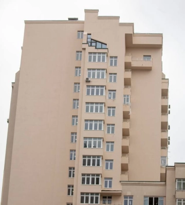У Києві відновили багатоповерхівку, пошкоджену російською ракетою влітку минулого року