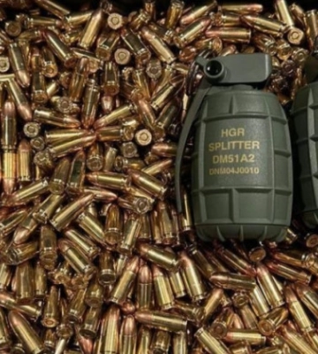 На Черкащині жінку підозрюють у незаконному гранат та патронів