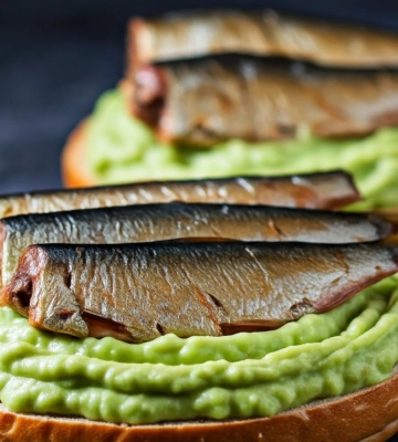 Рецепт бюджетного блюда на Новый год: вкусная закуска со шпротами за 10 минут