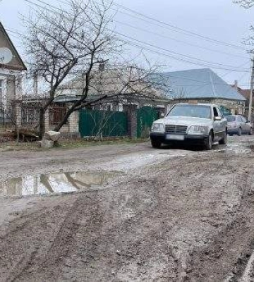 Дорога із багнюки: у Миколаєві майже 10 років жителі вулиці Коцюбинського чекають на ремонт