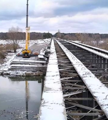 Для чего разбирают длинный мост через реку Тетерев