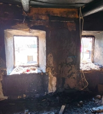 Под Мелитополем соседка спасла женщину из горящего дома 