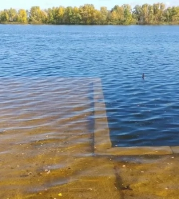 Уровень воды в Днепре продолжает расти: киевляне делятся новыми фото подтопленных берегов