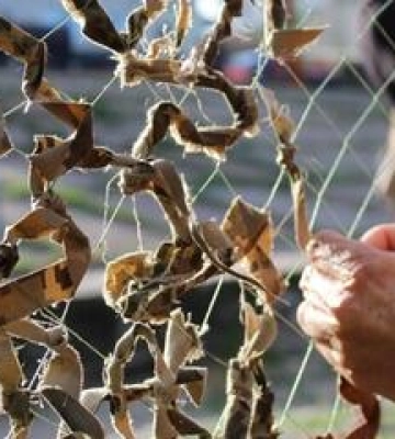 Полтавці плетуть маскувальні сітки &quot;під акомпанемент оркестру&quot;