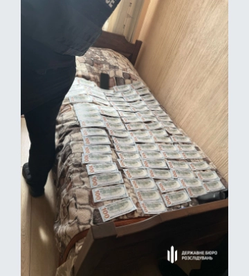 ДБР затримало правоохоронця, який хотів незаконно переправити до білорусі ухилянтів