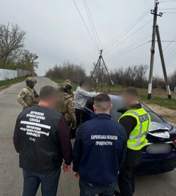 Харків’янин отримав 11 тисяч доларів за зняття з розшуку ухилянта (фото, відео)