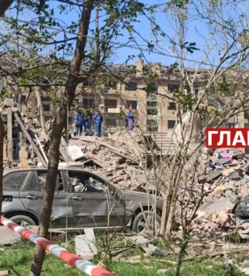 Київ оговтується після масованої російської атаки: фоторепортаж з місця удару