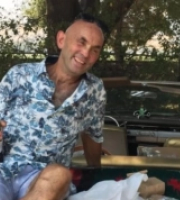 Митець та волонтер: що відомо про загиблого в Києві американця