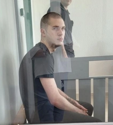 В Мелитополе судили студента, который зарубил отца и закопал его вместе с матерью