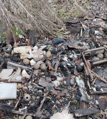 В Ізюмі місцеві мешканці показали місце зберігання 3340 російських боєприпасів, - поліція. ФОТО