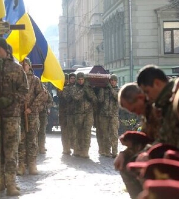 Із загиблими захисниками України Віталієм Мельником, Романом Прендотою та Володимиром Сухолитким попрощалися у Львові. ФОТОрепортаж