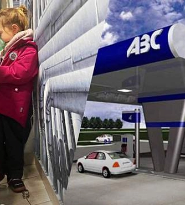 Фото дівчинки з Києва, яка робить інгаляцію на АЗС, до нестями зворушило українців
