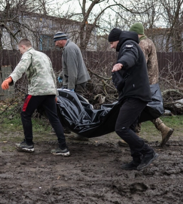 Тіла двох вбити окупантами цивільних виявили на визволеній Херсонщині. ФОТОрепортаж 18+