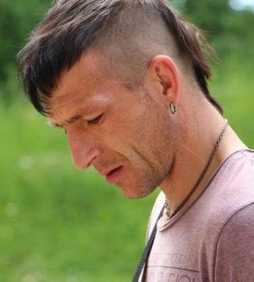 З тіла вбитого в Ізюмі дитячого письменника Вакуленка вилучили дві кулі