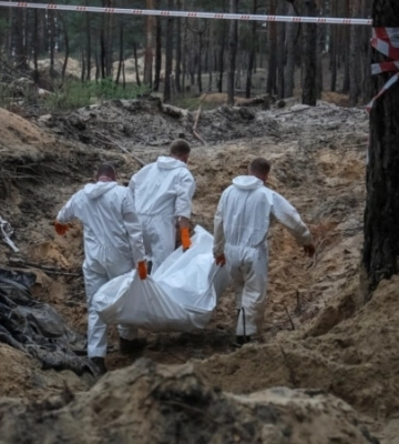 Поліція розповіла, скільки тіл убитих цивільних і військових ексгумувала на деокупованій Харківщині