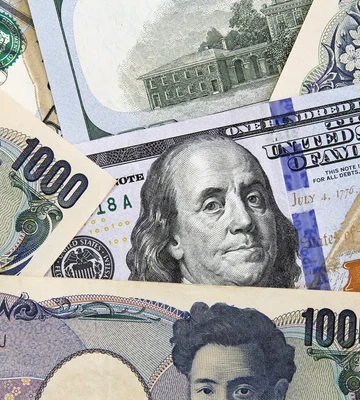 Долар стабілізується після втрат, а єна продовжує слабшати