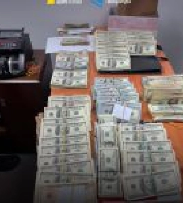 Детективи вилучили 850 тисяч доларів під час обшуків на Волині