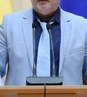Ексдоцент у Львові за 10 тисяч доларів обіцяв допомогти виїхати за кордон