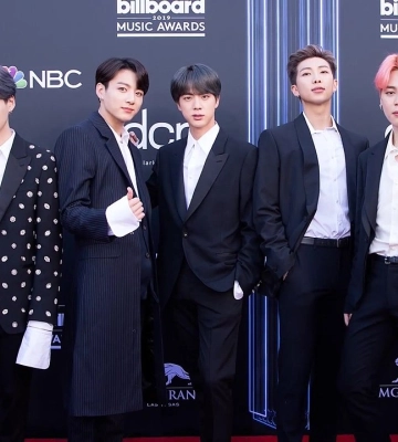 Продюсеру K-pop группы BTS грозит арест в Южной Корее