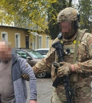 СБУ затримала в Херсоні екскерівника банку РФ, який вводив у місті &quot;рубльову зону&quot;. ФОТОрепортаж