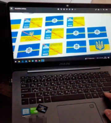 Под Киевом ликвидировали схему продажи фальшивых «спецпропусков», с которыми авто могли ездить в комендантский час: фото