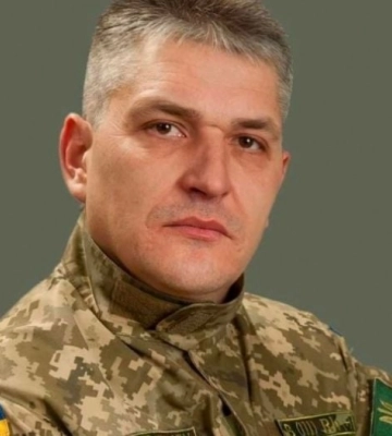 Доброволец, который встал на защиту Украины дважды: Героя из Мелитополя перезахоронили на Национальном военном мемориальном кладбище (видео)