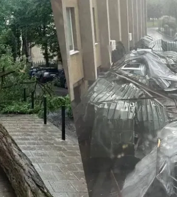 Після рекордної спеки Львів накрила потужна злива зі шквальним вітром