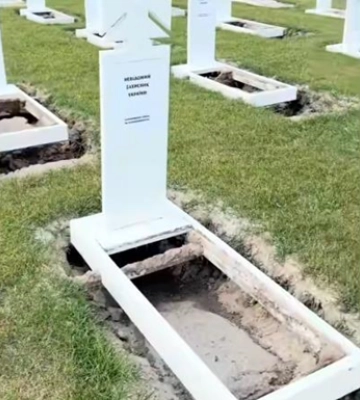 Національне військове кладовище розмили дощі: на могилах утворились провалля